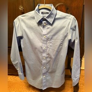 IZOD button-down long sleeves Boys Blue Shirt made with crisp, cool oxford blend